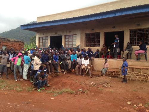 Darlington Chidarara from ZELA consults the community